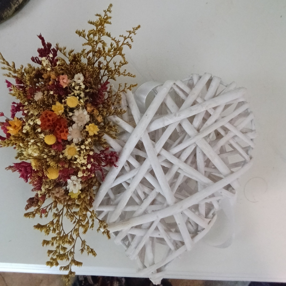 Rustic White Wicker Heart with Vibrant Floral Bouquet